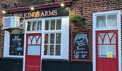 a pub with red doors